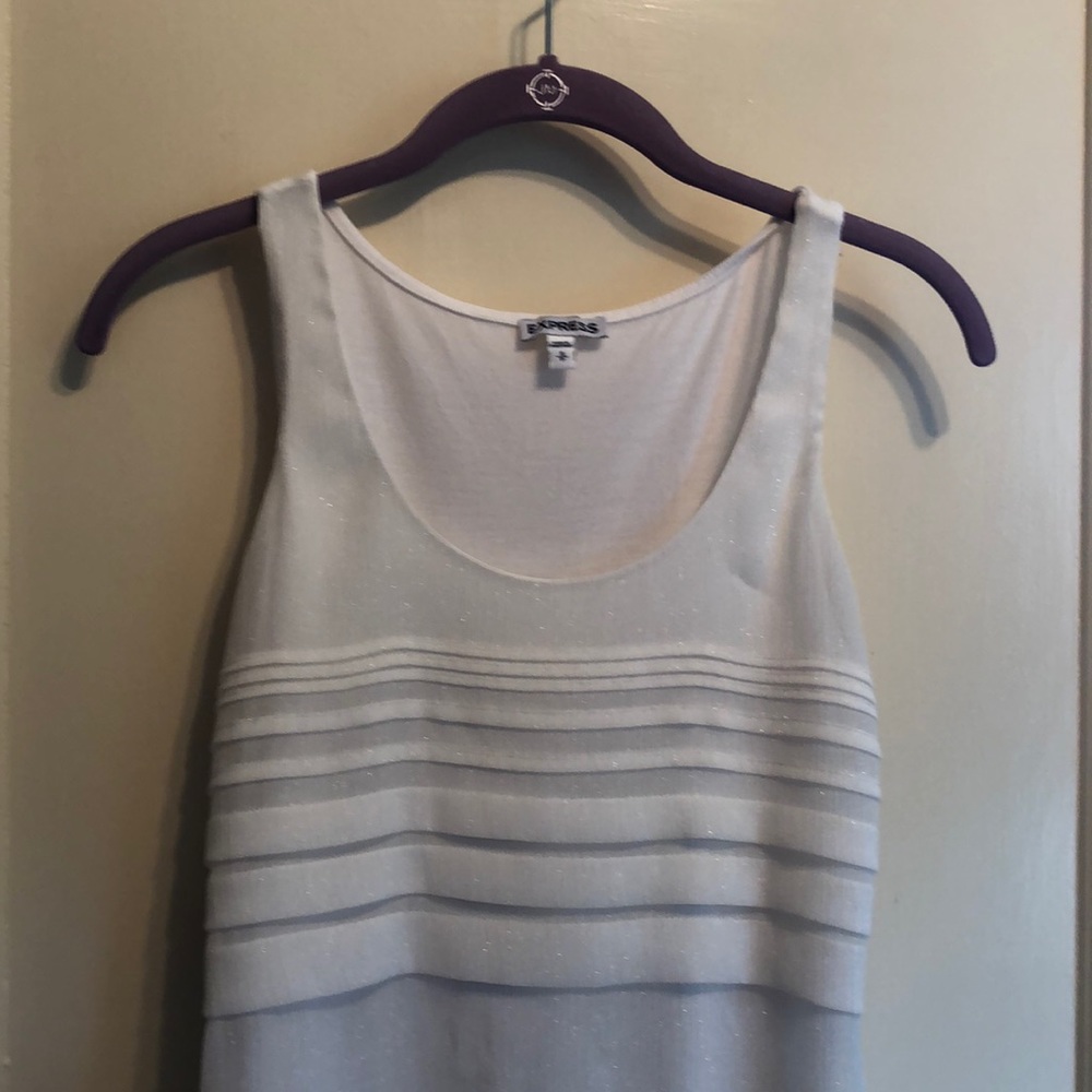 Express white sleeveless rayon shirt.